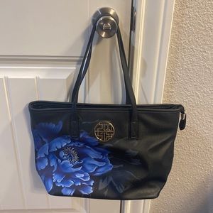 Black and flowered tote